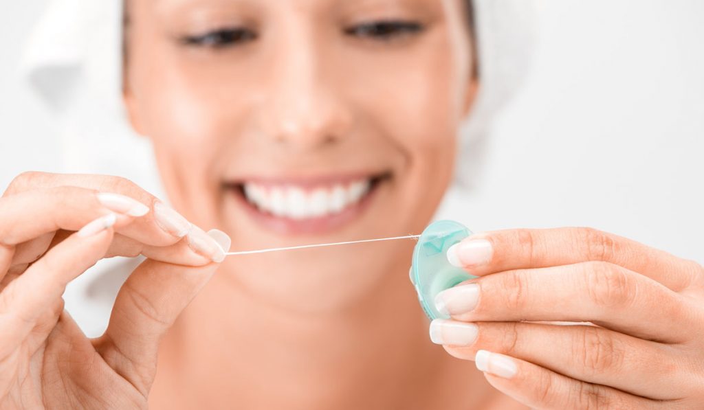 The Benefits of Flossing: A Key to a Healthier Smile